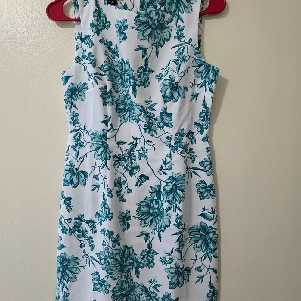 White dress with turquoise flowers